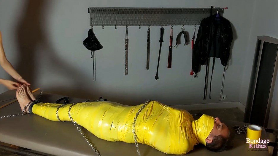 BONDAGEKITTIES - (Spanish) - Burglar Is Mummified And Punished By Two Dominatr
